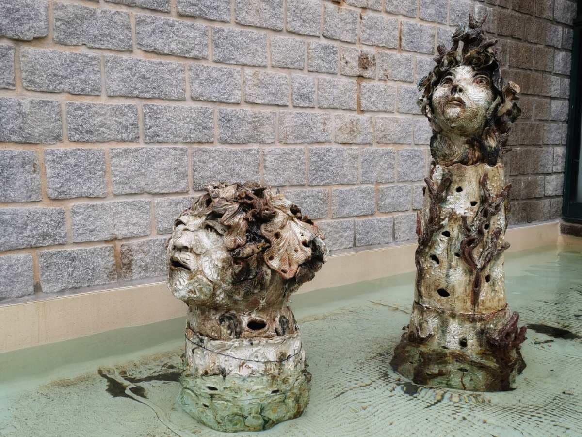 Sculptures in a fountain in the center of the town of Monchique Algarve